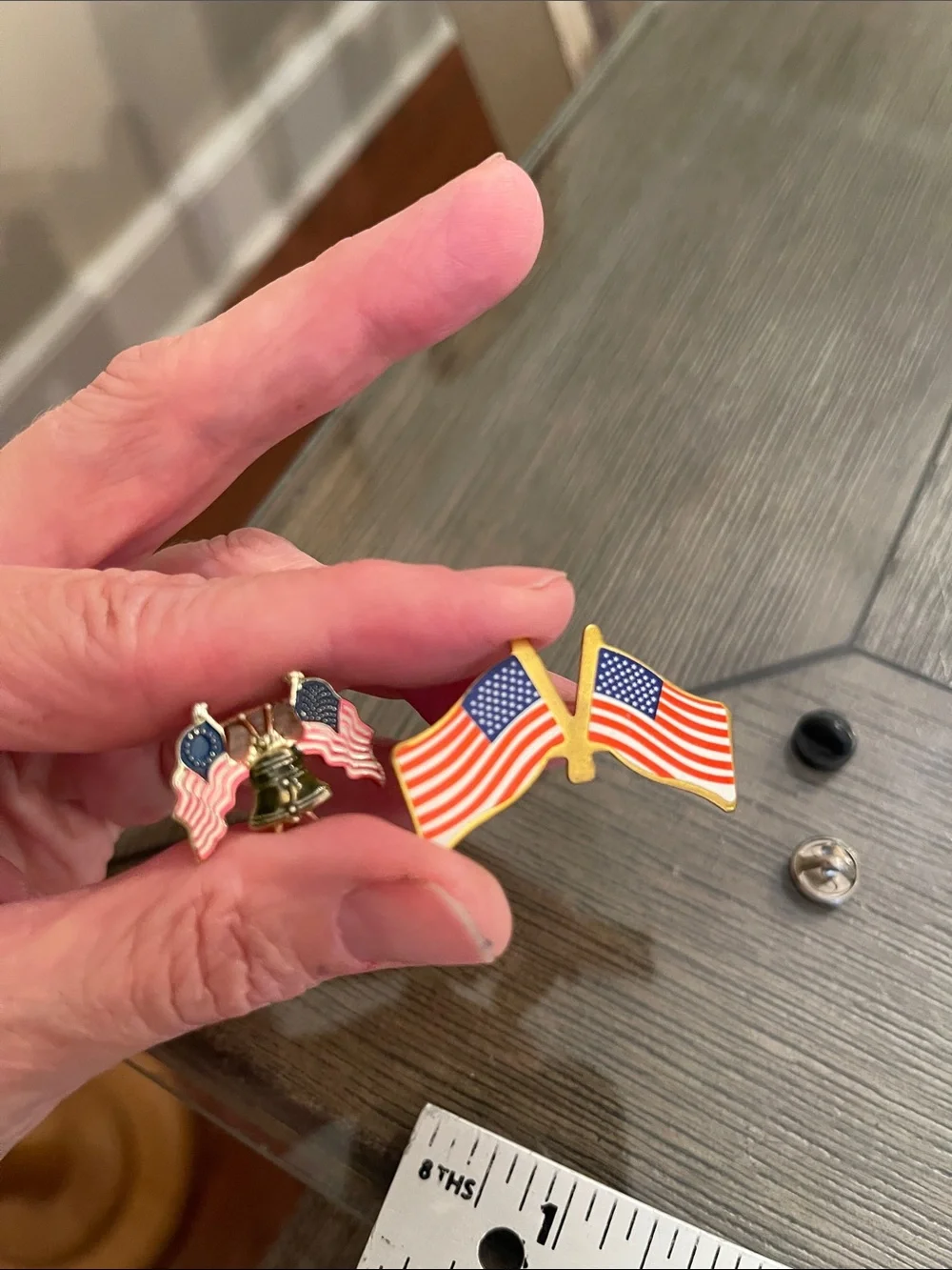 Patriotic Lapel Pin Features Liberty Bell Between Two Crossed American Flags